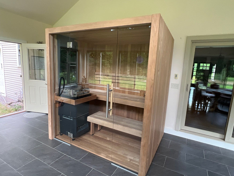 Custom Indoor Sauna Kit with a Glass wall, compact design made to fit any specific space.