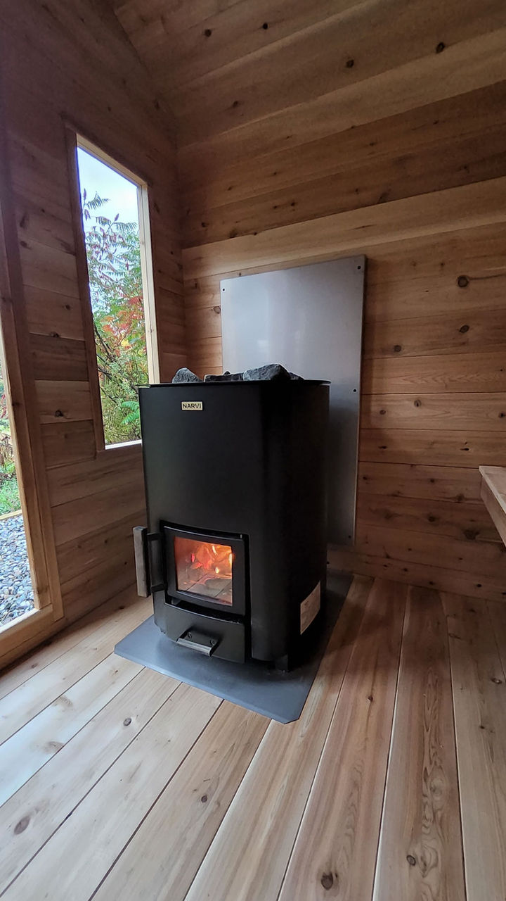 Narvi Wood Fired Stove in a Custom Sauna near the lake.