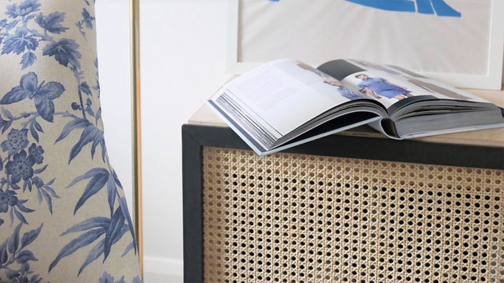 a picture of a rattan cane webbing cabinet and book