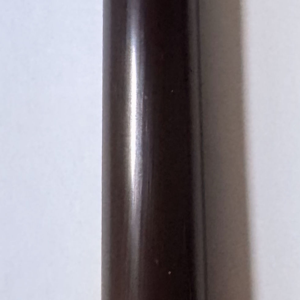 Serene's beeswax candle colour Burnt Umber, top view.