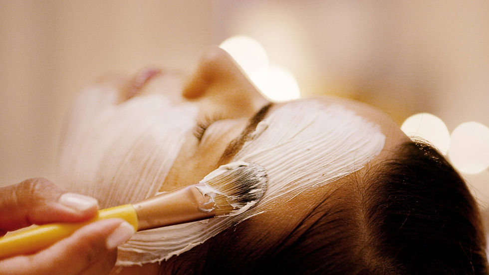Eye-level view of various natural skincare ingredients in bowls