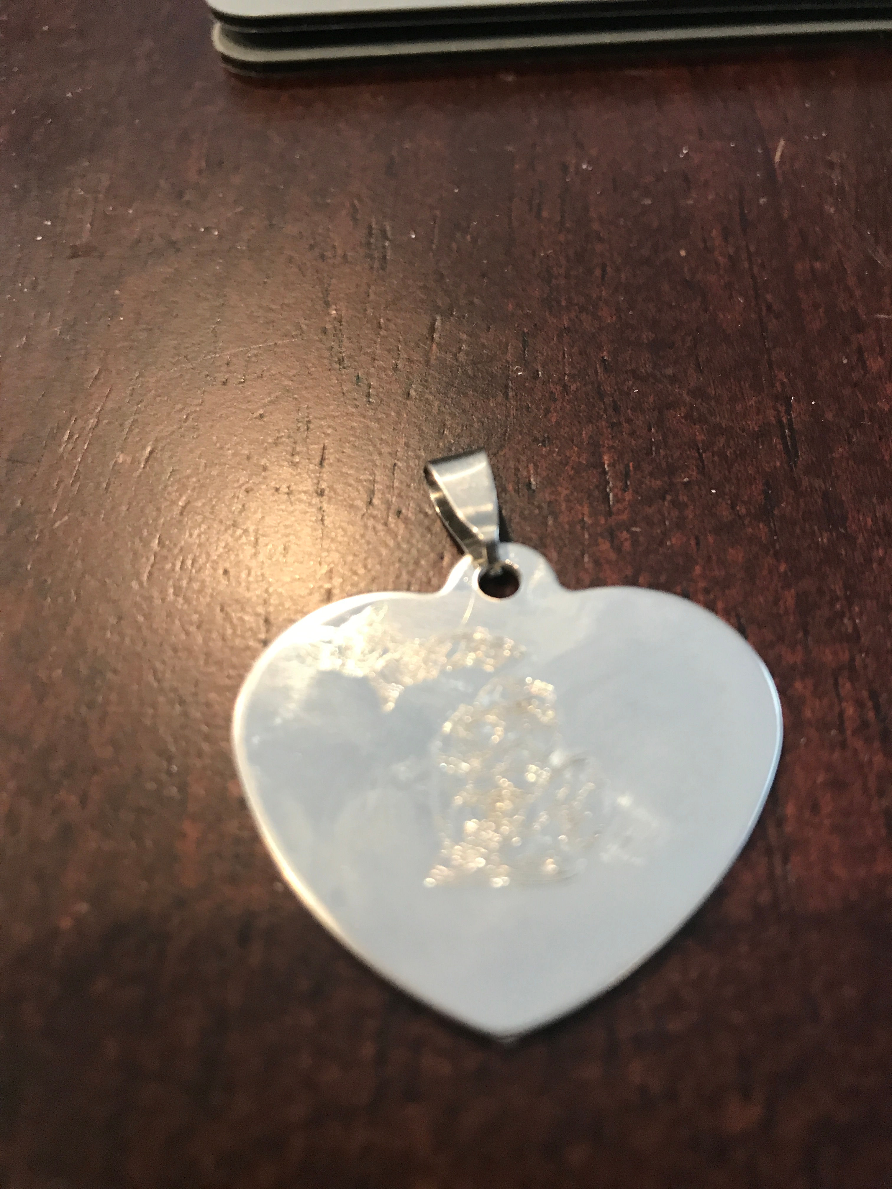 Custom Engraved metal jewelry