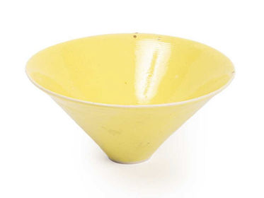 YELLOW GLAZE CONICAL BOWL IN AUCTION 