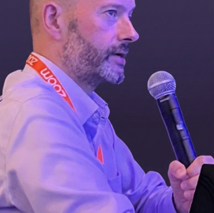 Tim Banting, speaking at a conference. Founder and Principal Analyst of So What?, Now What!
