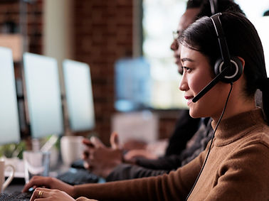 paralyzed-asian-employee-working-call-center-reception-disability-friendly-office-female-o
