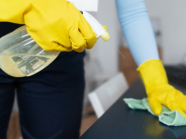 person-taking-care-office-cleaning_edited.jpg