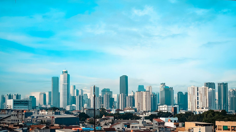 Daytime view of the Jakarta skyline with high-rise office towers