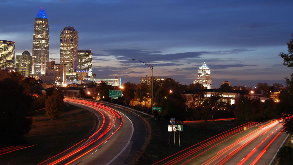 photo taken in Charlotte NC showing blurred traffic at night at the 277 interchange near m