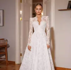 A-line Lace wedding dress with deep plunge neckline and long fitted sleeves