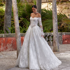 Lace princess wedding dress with long sleeves and bardeau neckline