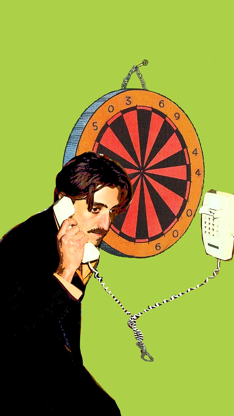 johnny with phone and darts.jpg