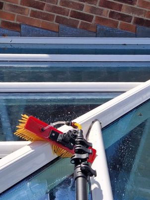 Conservatory roof clean with water fed pole WFP.