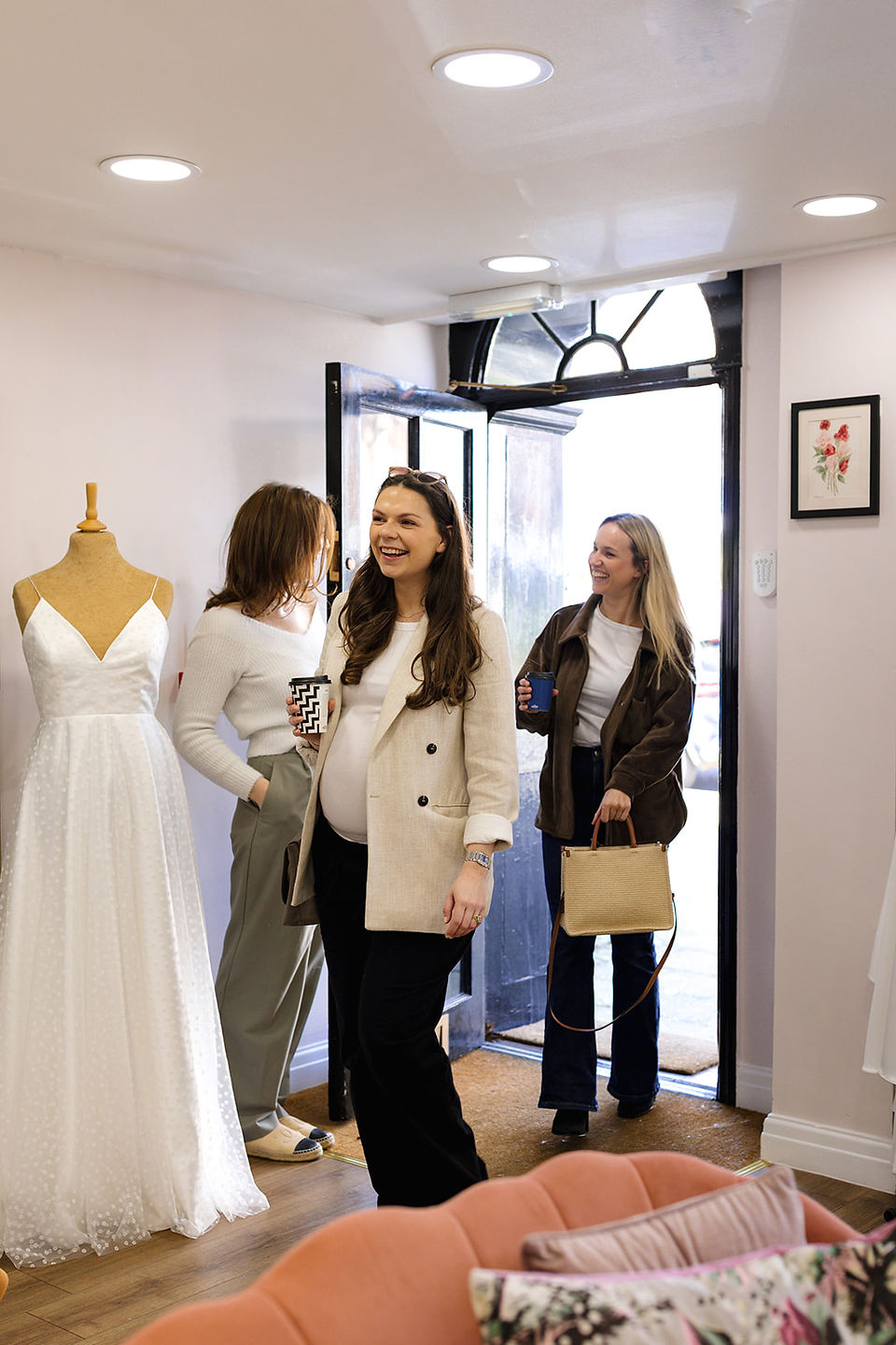 Bridal Party being welcomed into Vicki's Bridal Boutique - Photo by Hannah Partridge Photography