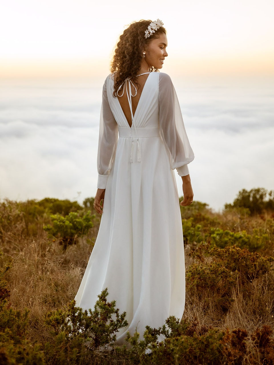 Full length crepe wedding dress with tassel back detail
