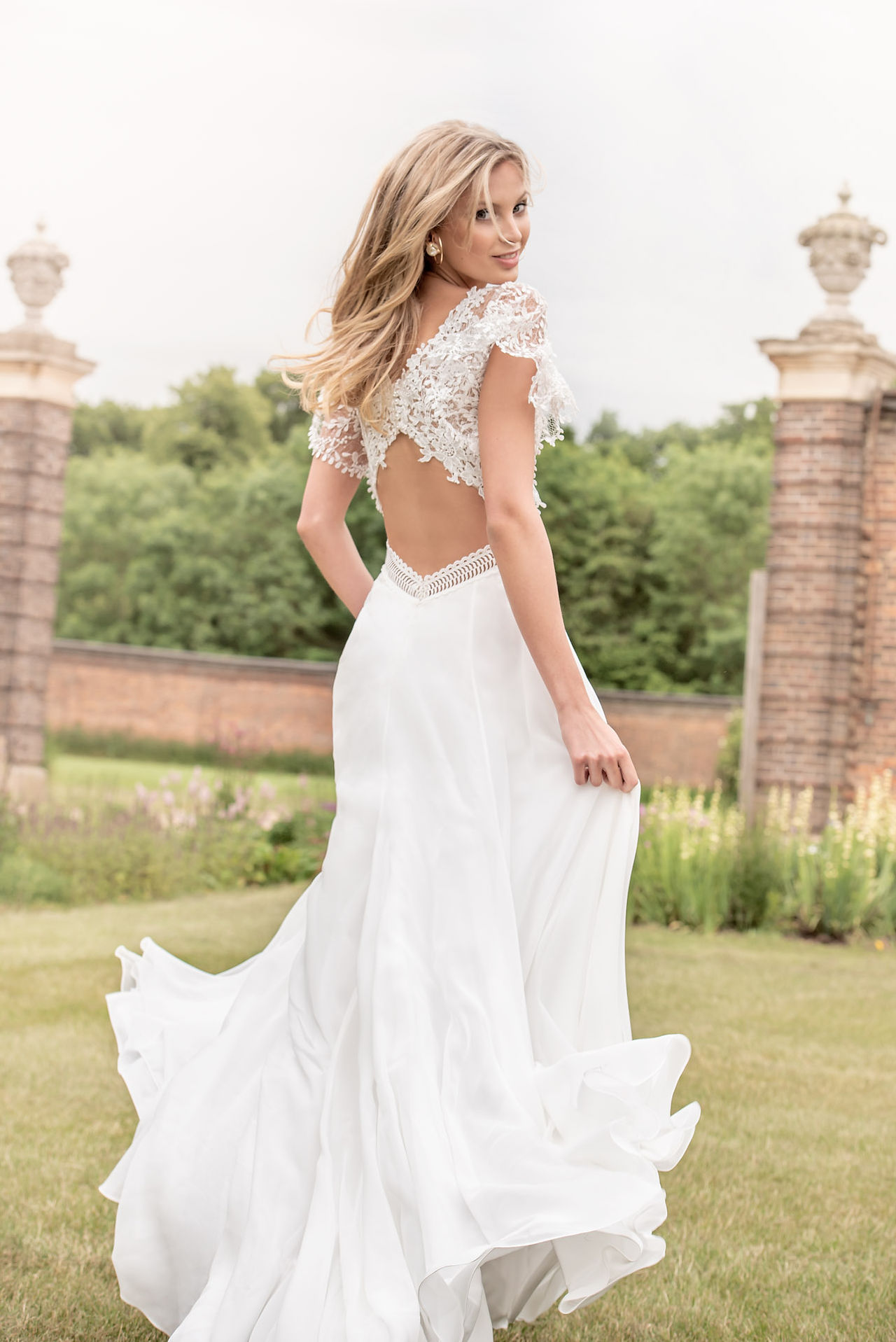 Empire waist aline wedding dress with sequin bodice and flutter sleeves