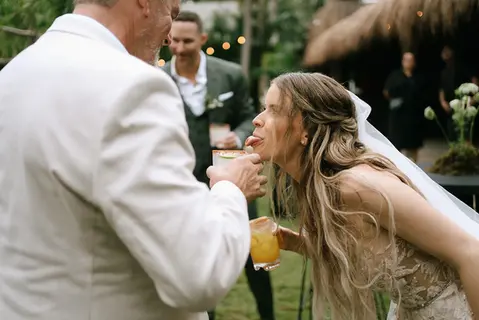 Bride and groom candid moment at luxury destination wedding Tulum