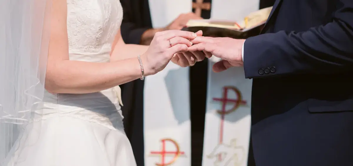 Groom performing symbolic ritual during a luxury wedding ceremony in Mexico.