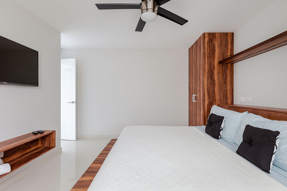 Miniature : Dining area with seating for six and stylish lighting in Playa del Carmen 2-bedroom condo