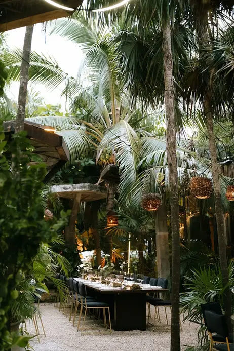 Jungle wedding reception table at luxury destination wedding Tulum