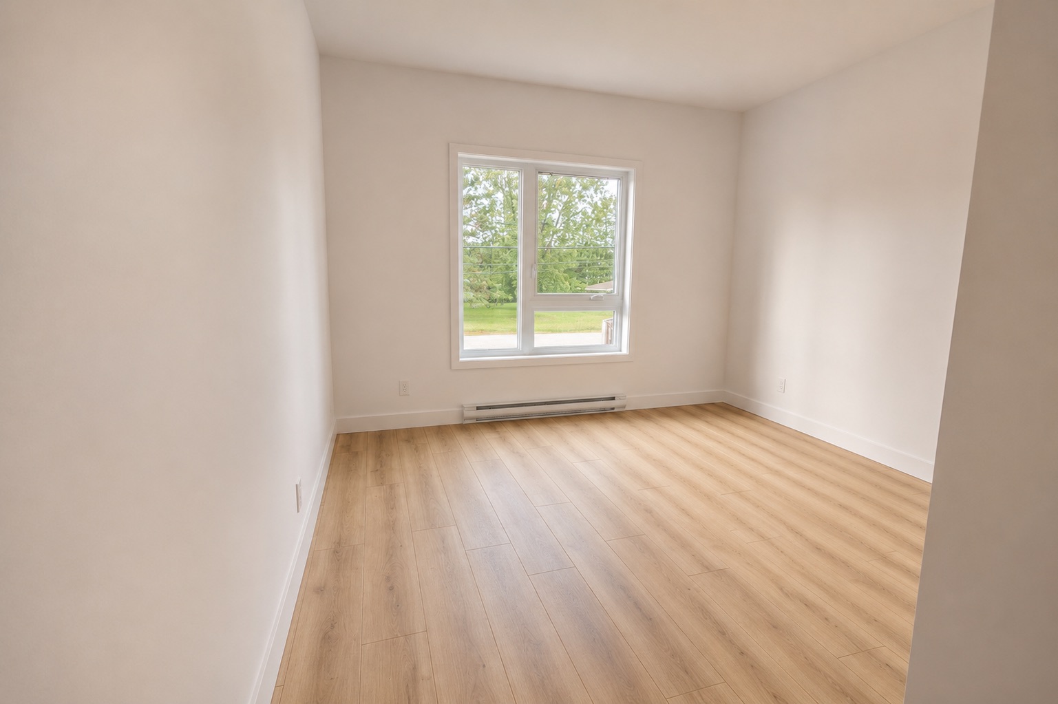 Chambre à l’étage d’une maison de ville 4 ½ à Saint-Boniface.