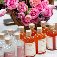 Floral arrangement with saffron drinks at Pomexpo Norooz Bazaar