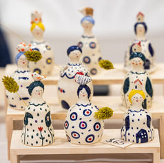 Handmade Persian ceramic dolls displayed at Pomexpo Norooz market