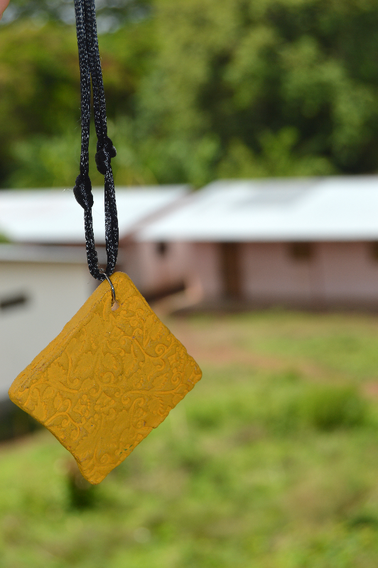 Thumbnail: Clay Medallion on Cord (Solid)