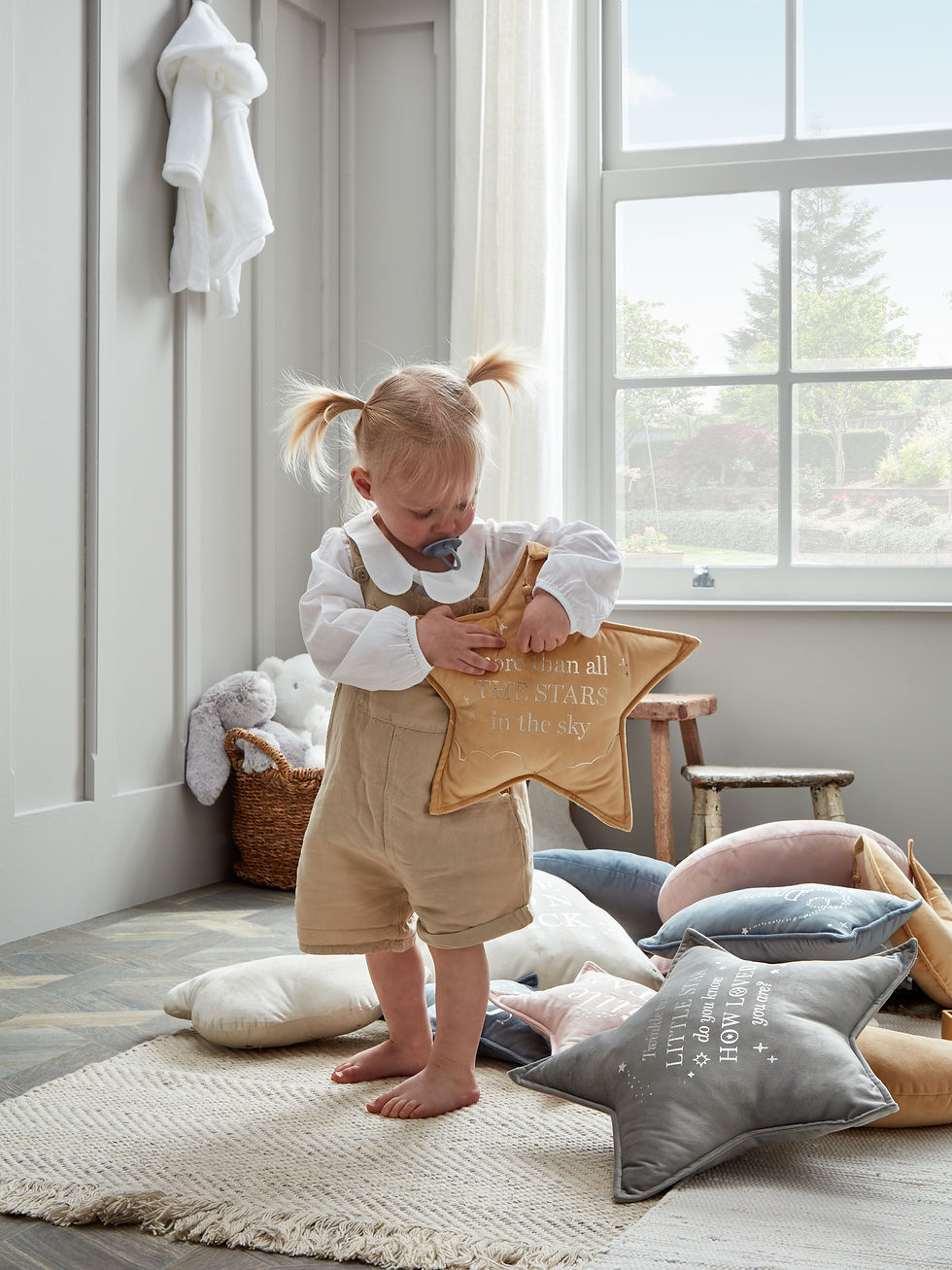 baby girl playing with toys