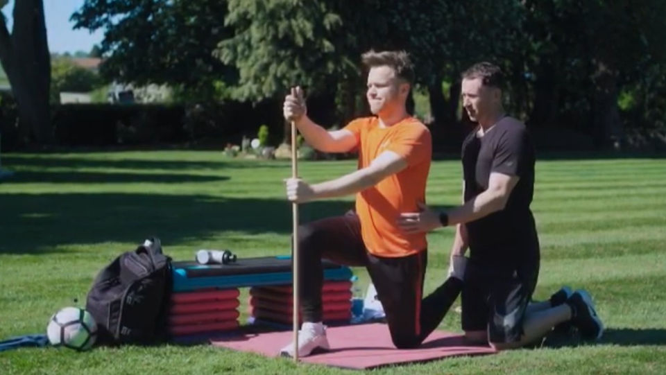 Rob Solly training Olly Murs outside