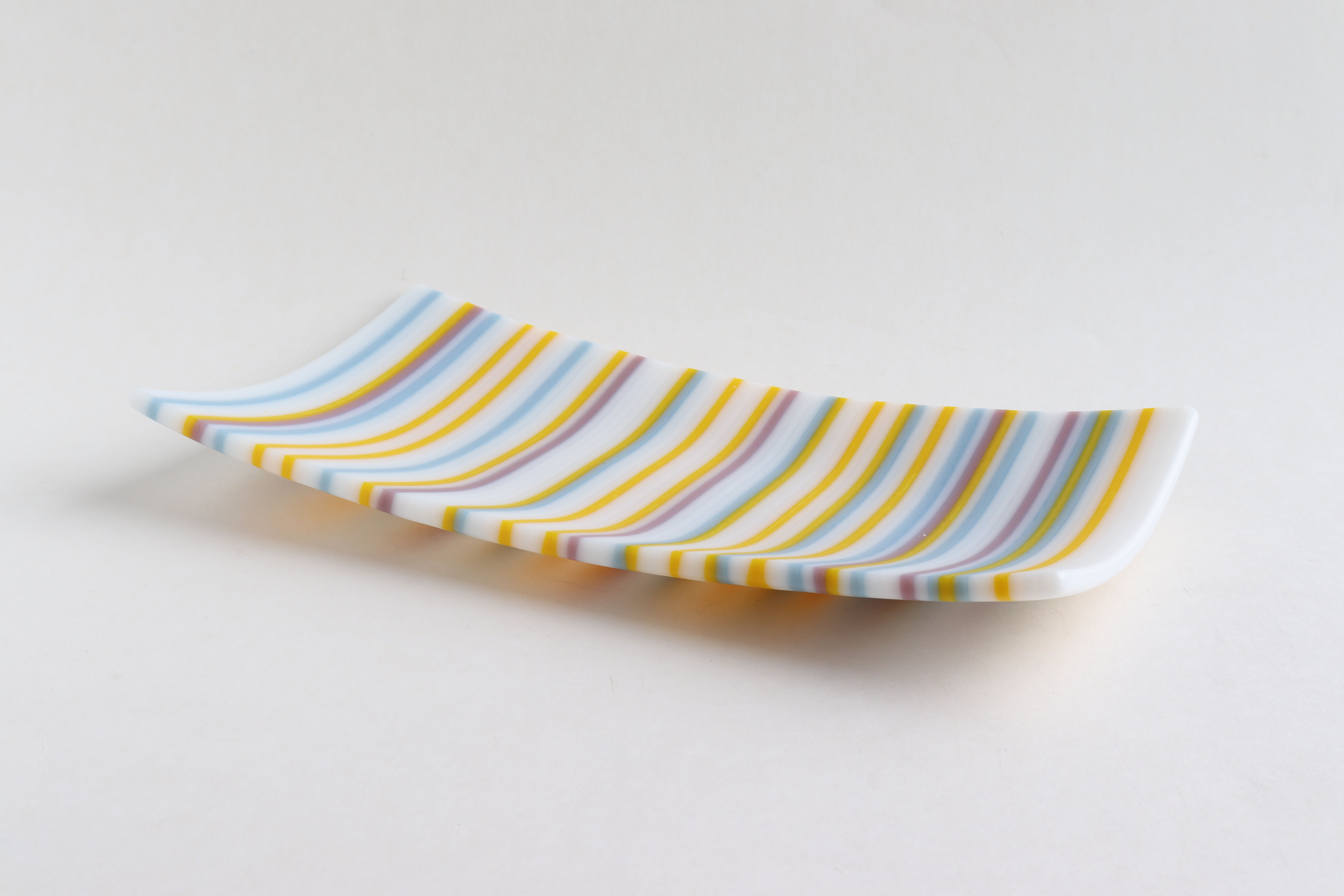 kiln formed glass art tray in danish pastel colors side view