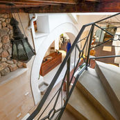 Picture from above. Staircase that leads down. 