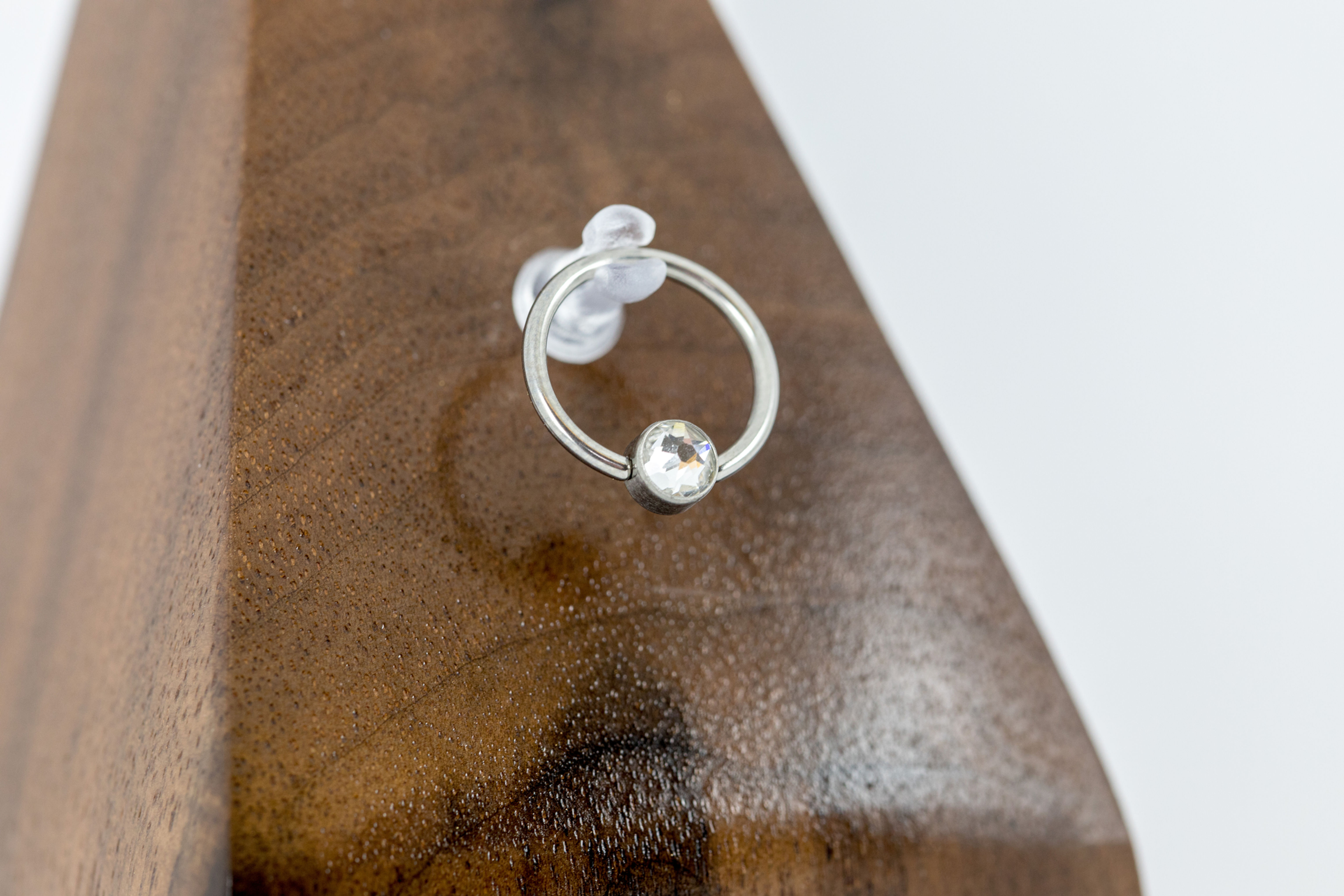 1.2 (16g) Clear Bezel Set CZ Bead Captive Ring