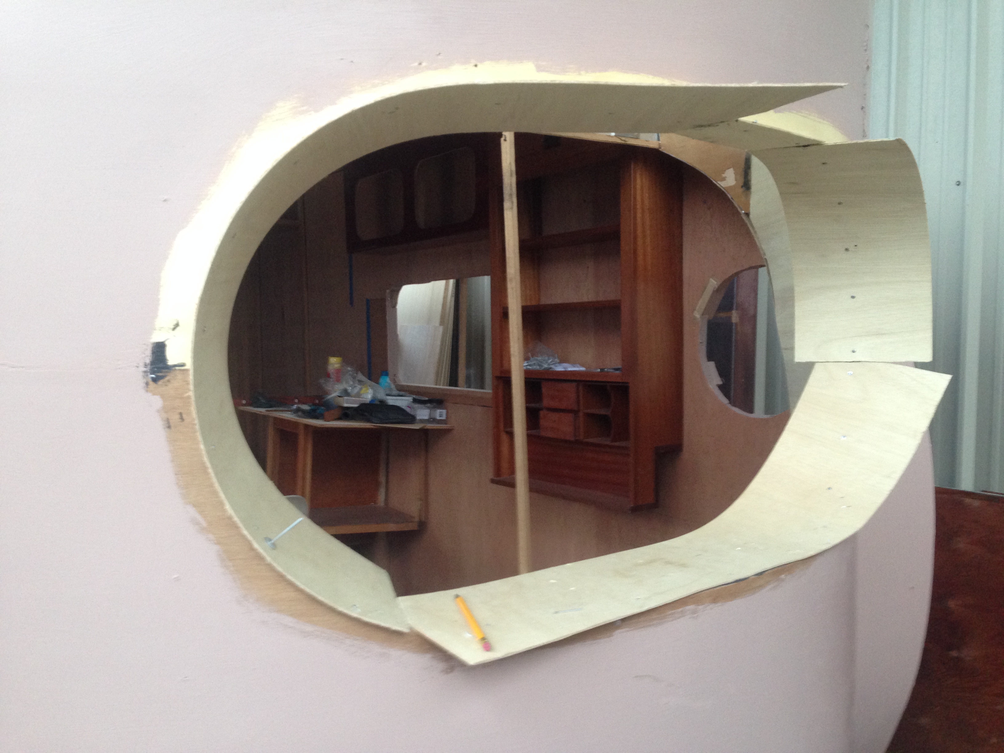 Plywood around front window