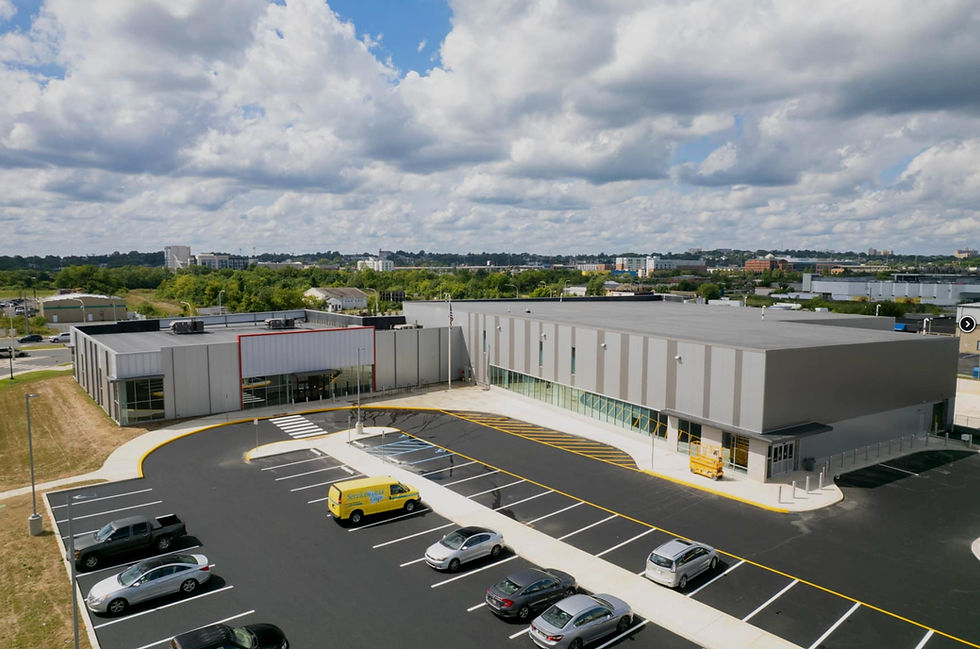 This is a commercial roof, and we installed a fully adhered black EPDM membrane, mechanically attached roof insulation, new ES-One metal trim from Metal ERA, flashed the parapet wall, and new coping metal.