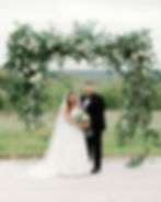 Couple Under Arch - Mae's Ridge in Dripping Springs Texas