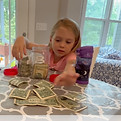 Video of me giving my 6- and 4-year-old their allowance
