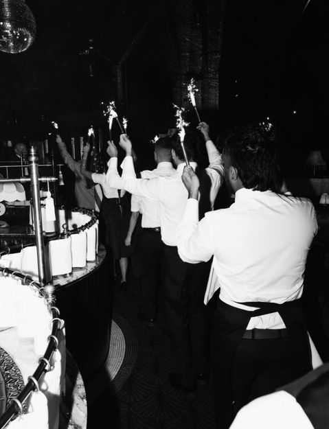 restaurant staff in white shirt and aprons