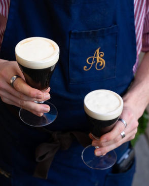 quality blue bespoke apron with gold embroidery