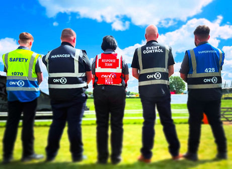 onyx event team in equipment vest and cargos