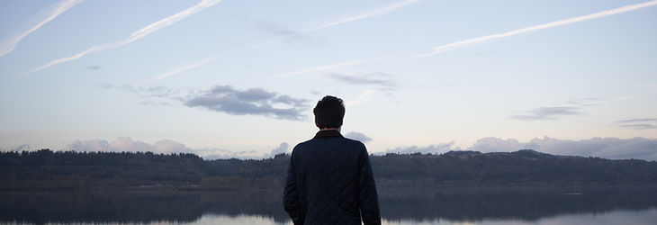 Man Facing Lake