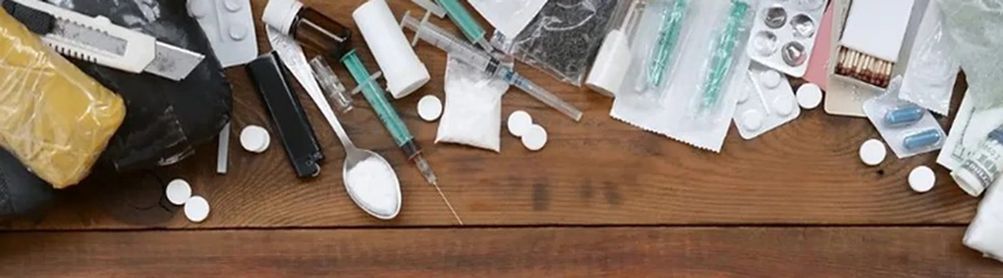 variety of narcotics and paraphernalia used for illegal drugs