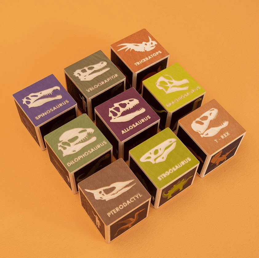 Thumbnail: wooden Uncle Goose Dinosaur blocks on orange background