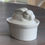 Thumbnail: White Bunny Rabbit Casserole dish on a gray wooden tabletop