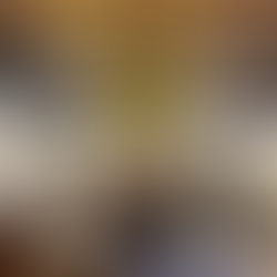 huge pottery vase filled with forsythia on table at fdp Studio+Shop