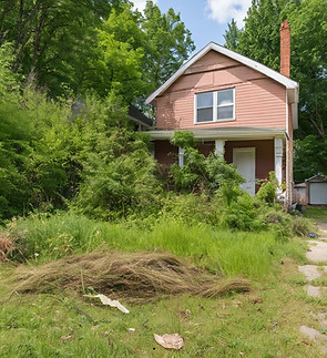 Messy exterior of a house, overgrown weeds and grass in the front yard, with small piles o