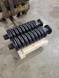 Rebuilt track adjusters for John Deere & Hitachi excavators