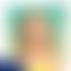 Female toddler sim with braided hairstyle, wearing a polka dot top on a green background.