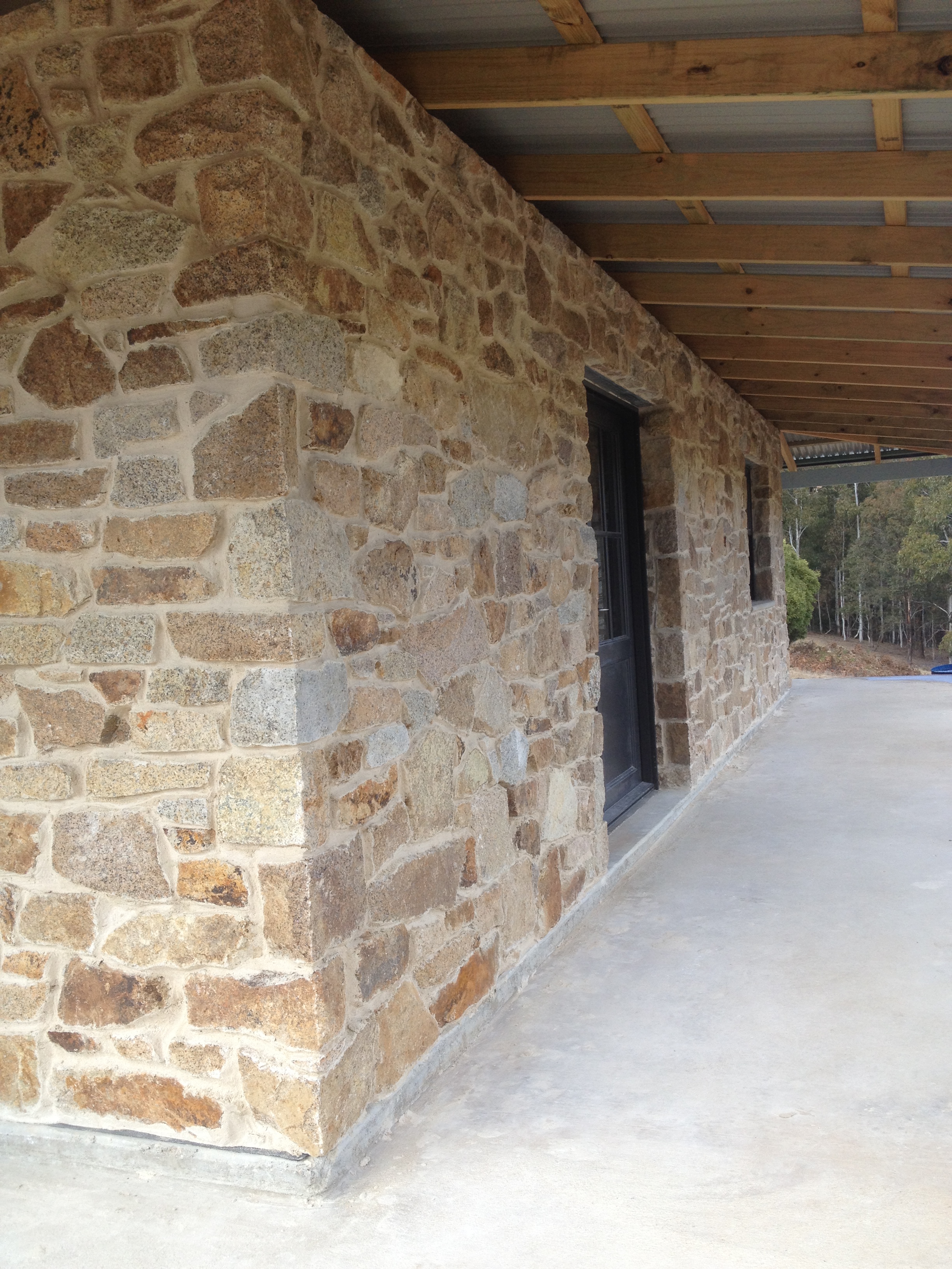 Granite walling with off white mortar
