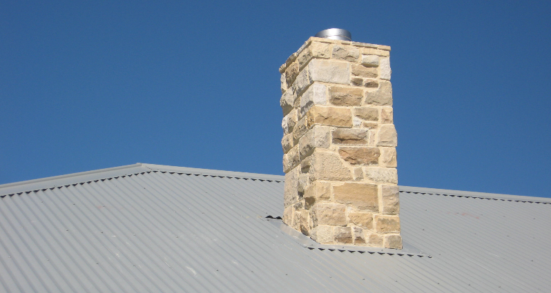 Stone cladding to Chimney