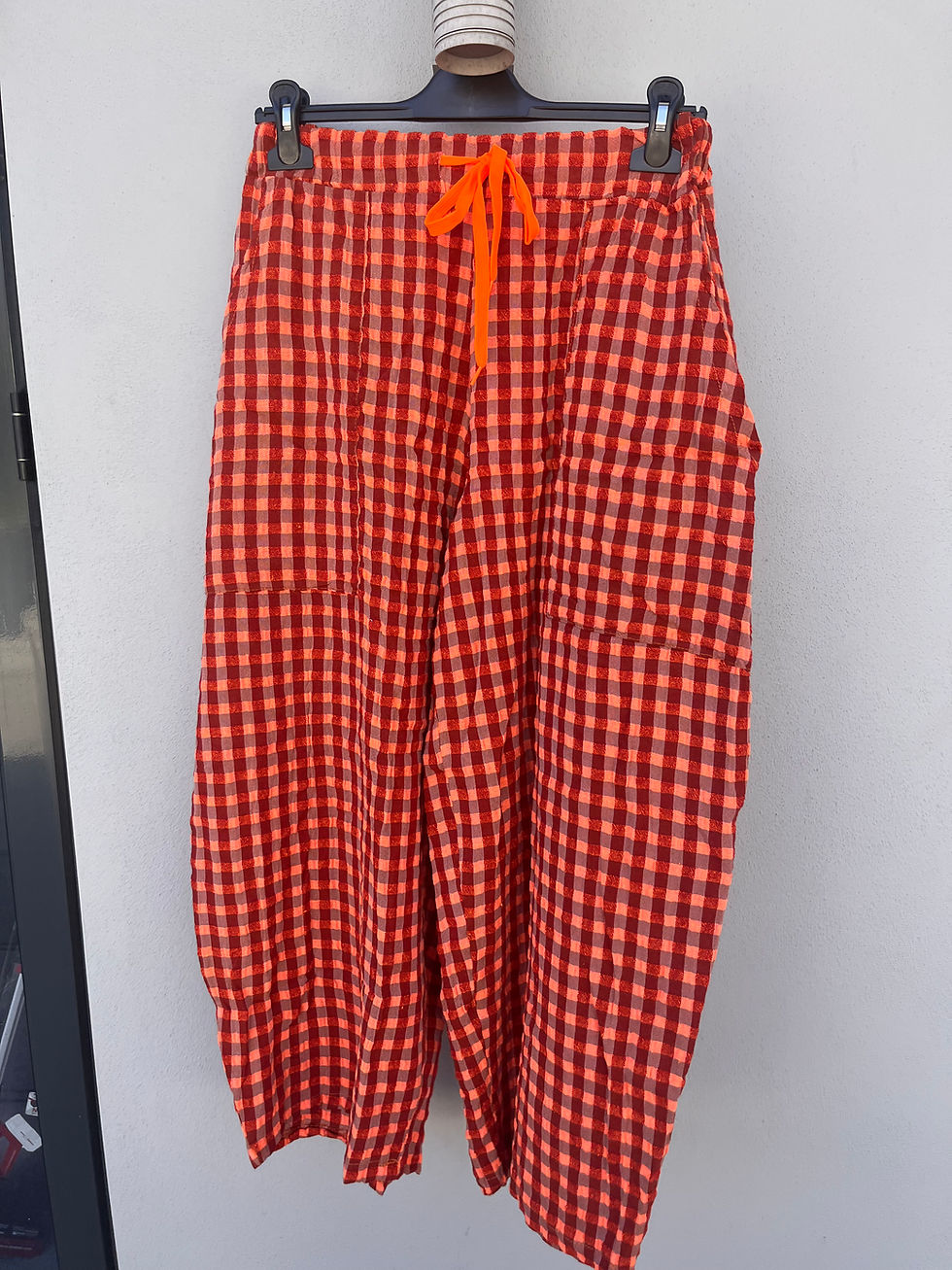 Thumbnail: Dilli Dolly Gingham Barrel Leg pant in Neon Orange / Rust 